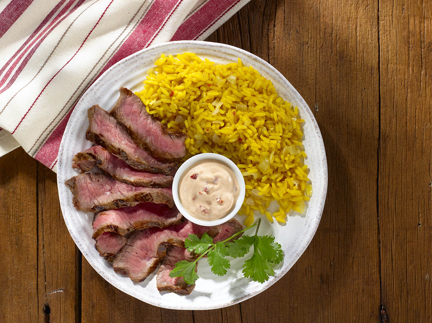 Chipotle-Spiced Steak with Garlic Yellow Rice