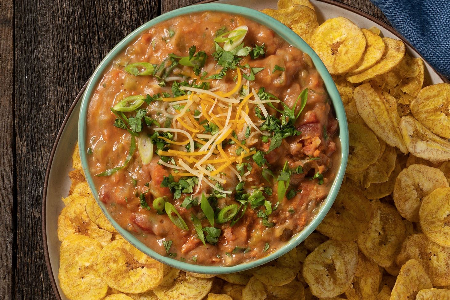 Warm and Spicy Chorizo Bean Dip with Plantain Chips