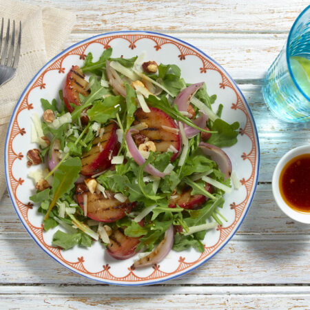 Arugula Salad with Grilled Plums and Manchego