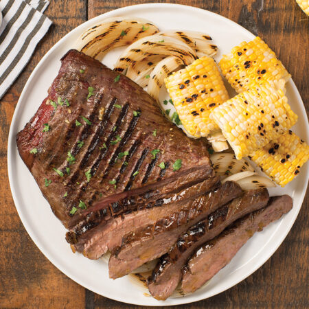 BBQ Flank Steak with Grilled Onions and Corn