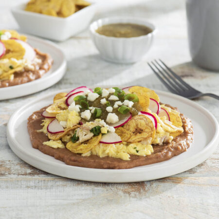 Plantain Chip “Chilaquiles” with Adobo Chicken, Refried Beans and Salsa Verde